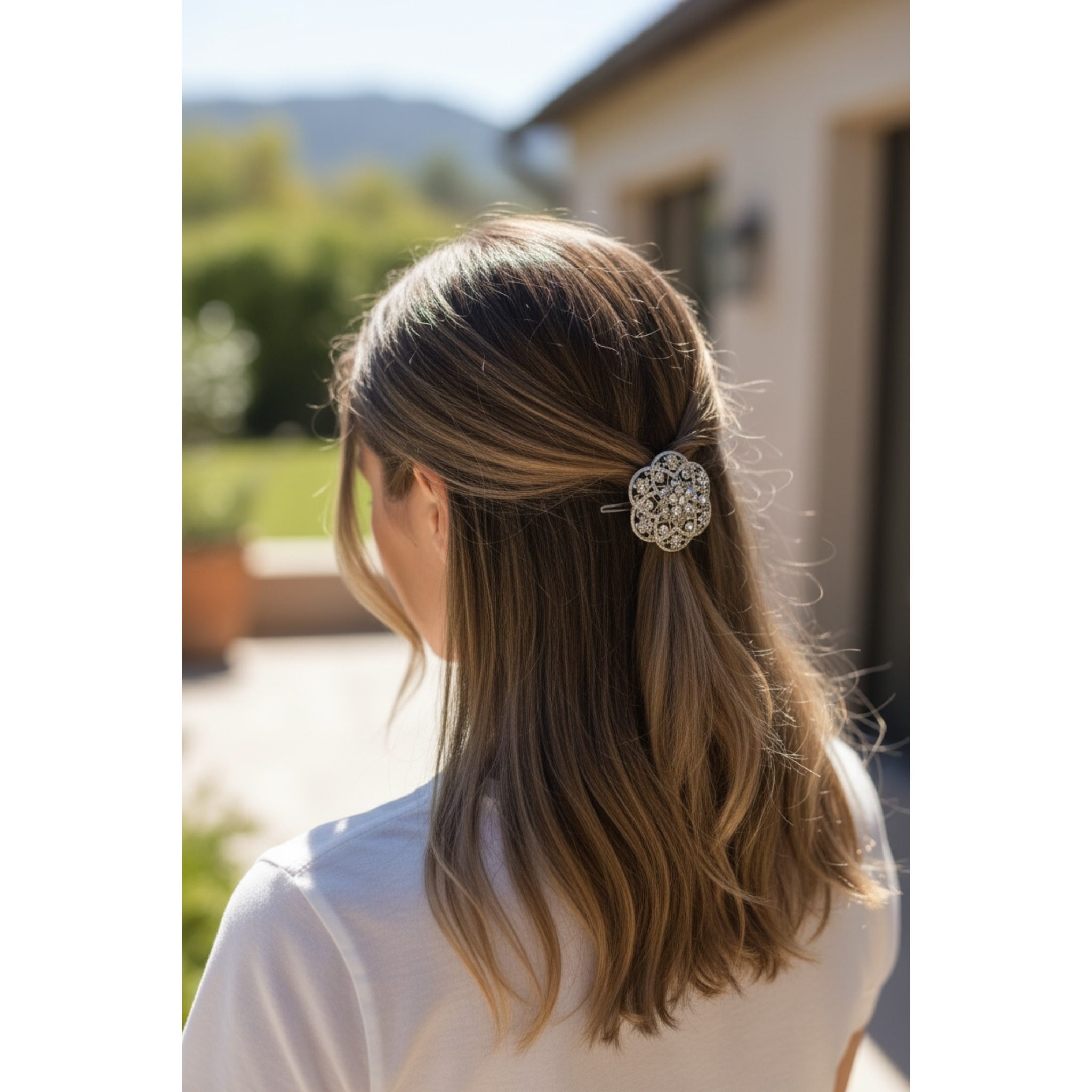 Person with a decorative hair clip outdoors
