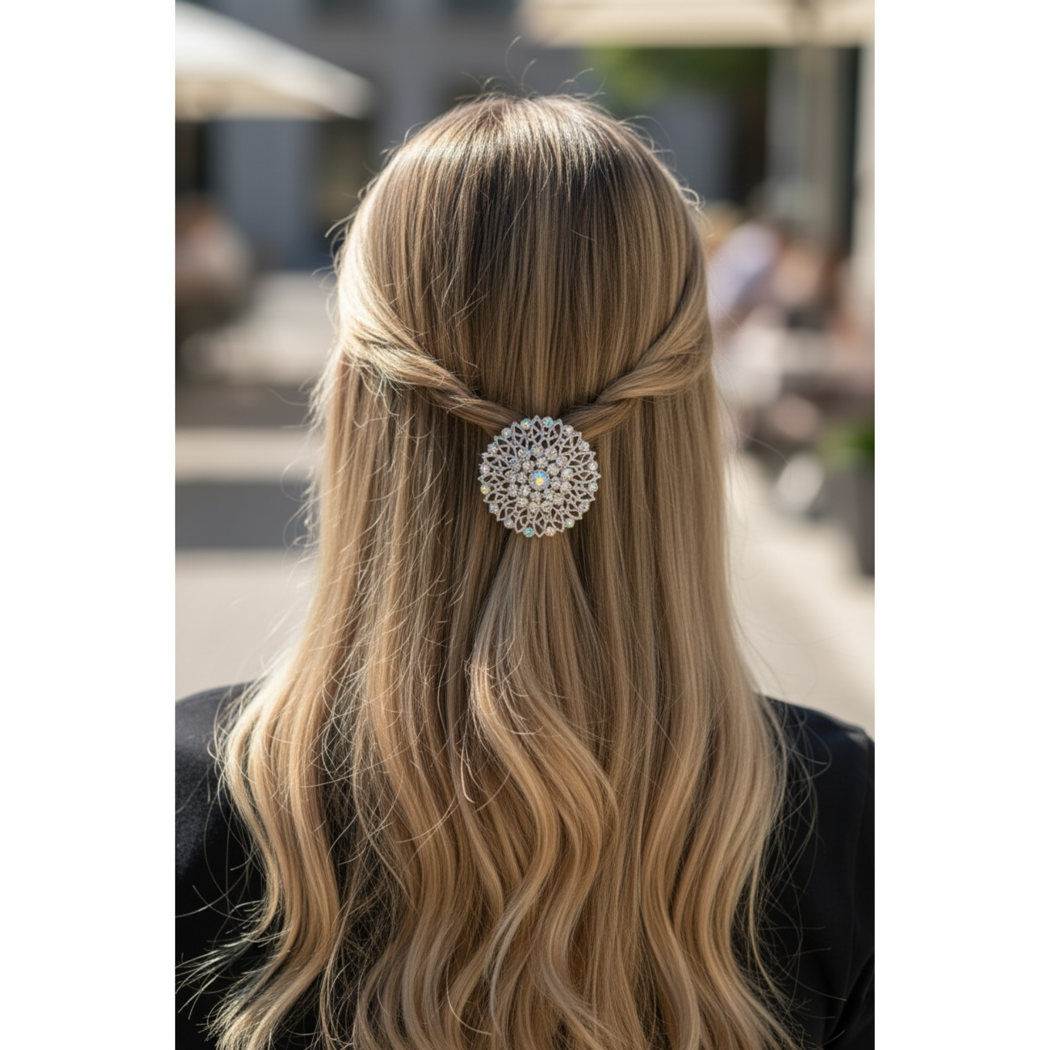 Person with long blonde hair wearing a decorative hairpin outdoors