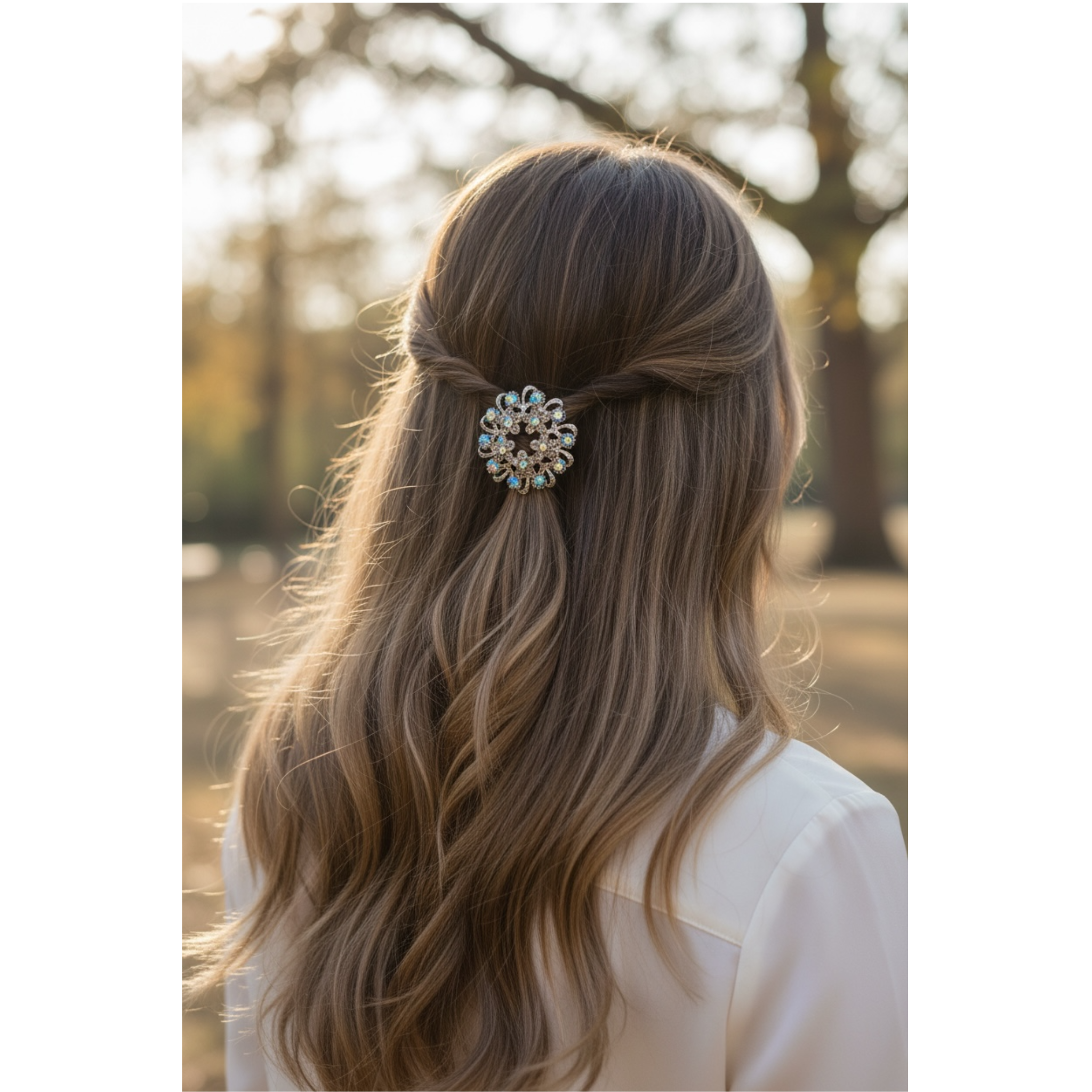 Person with long hair wearing a decorative hair clip outdoors