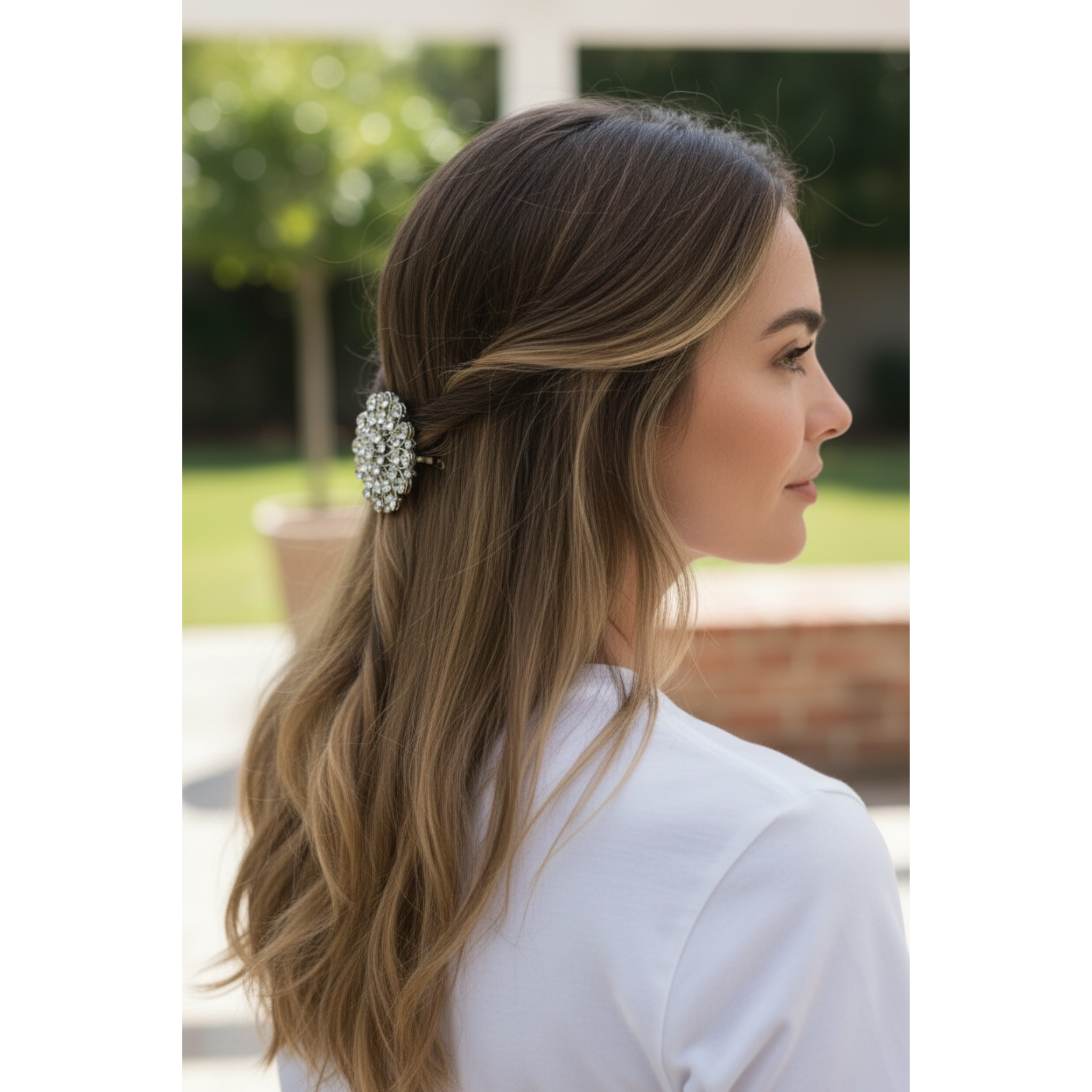 Woman with a decorative hair clip outdoors