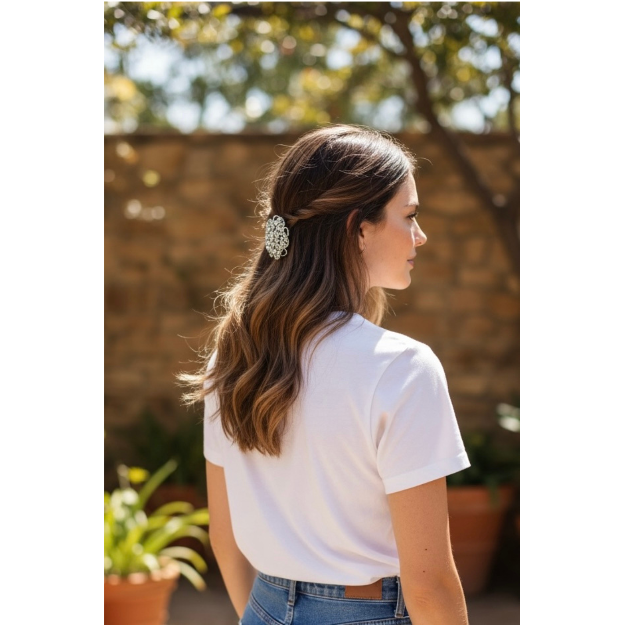 Woman with a decorative hair clip in an outdoor setting