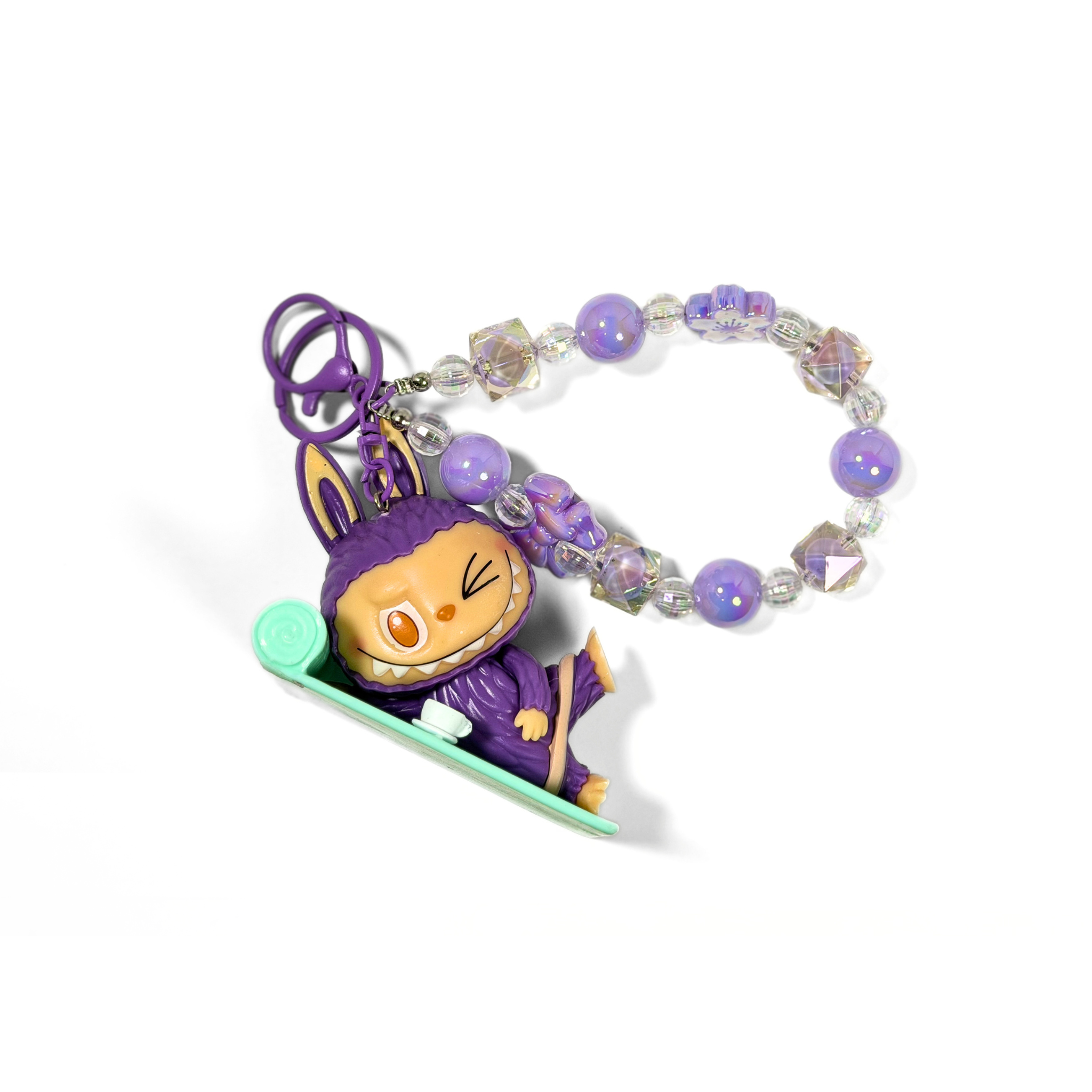 Labubu Lazy Yoga Keychain with a beaded purple keychain on a white background