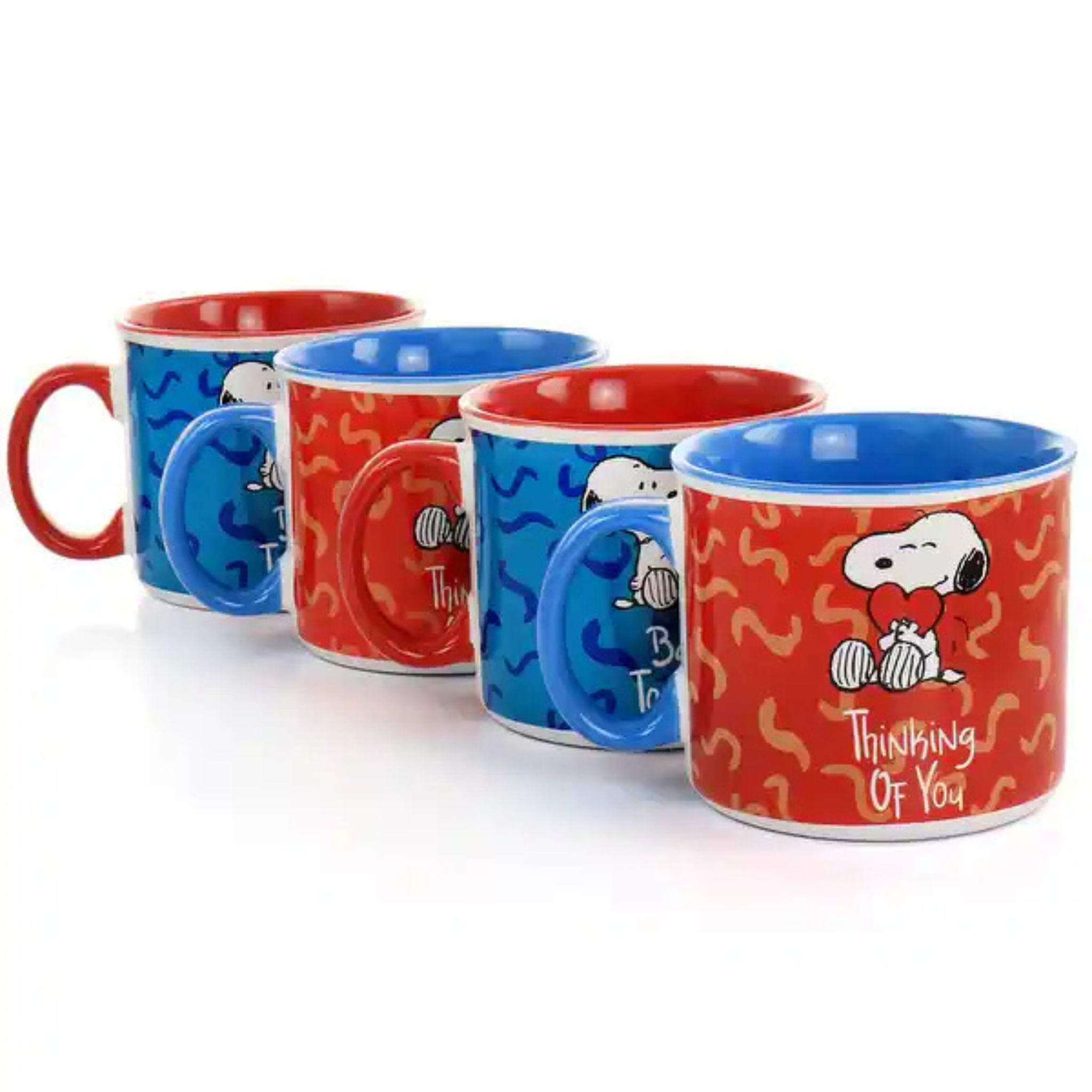 Set of four Snoopy-themed mugs with red and blue designs on a white background