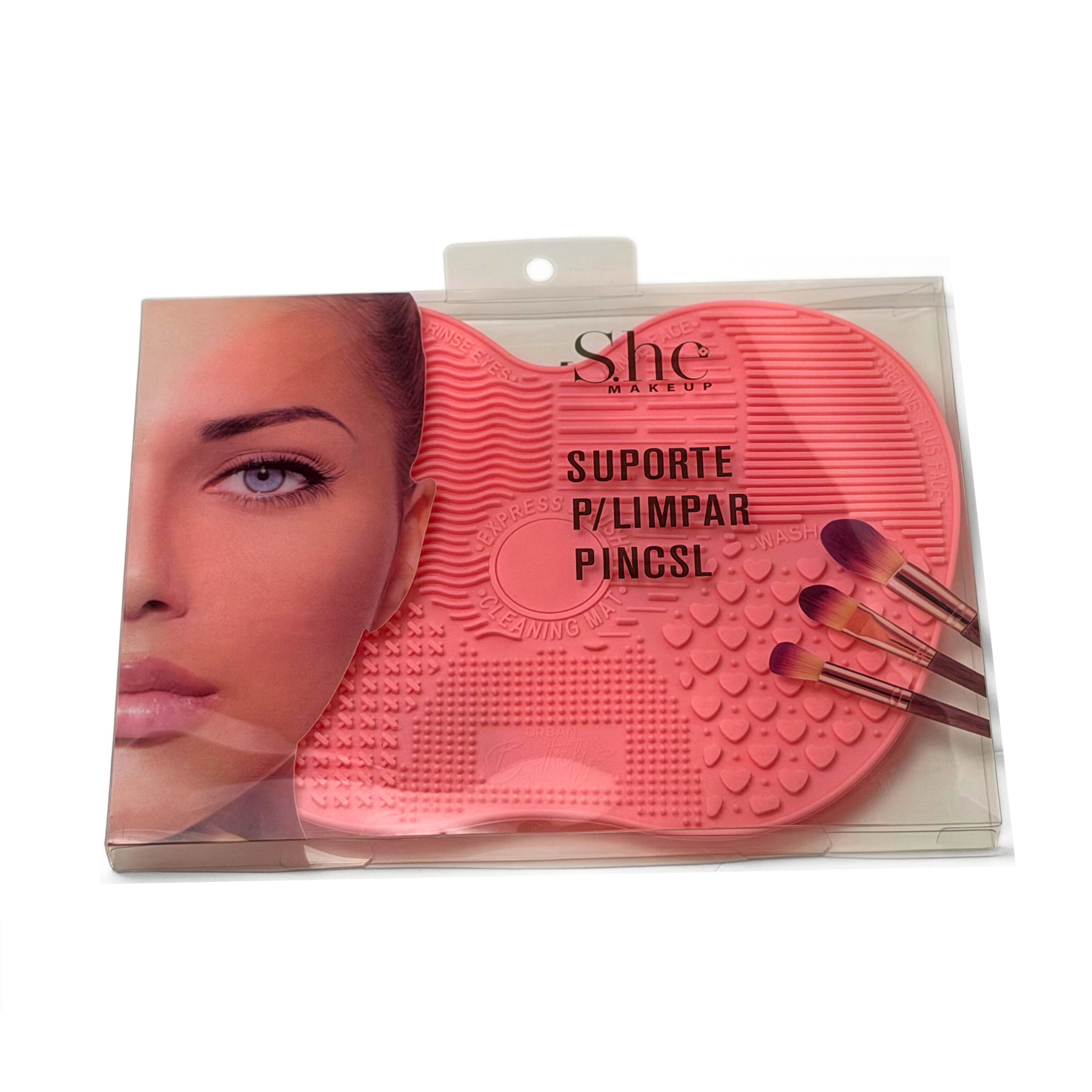 She makeup brand makeup brush cleaning mat in color peach on a white background.