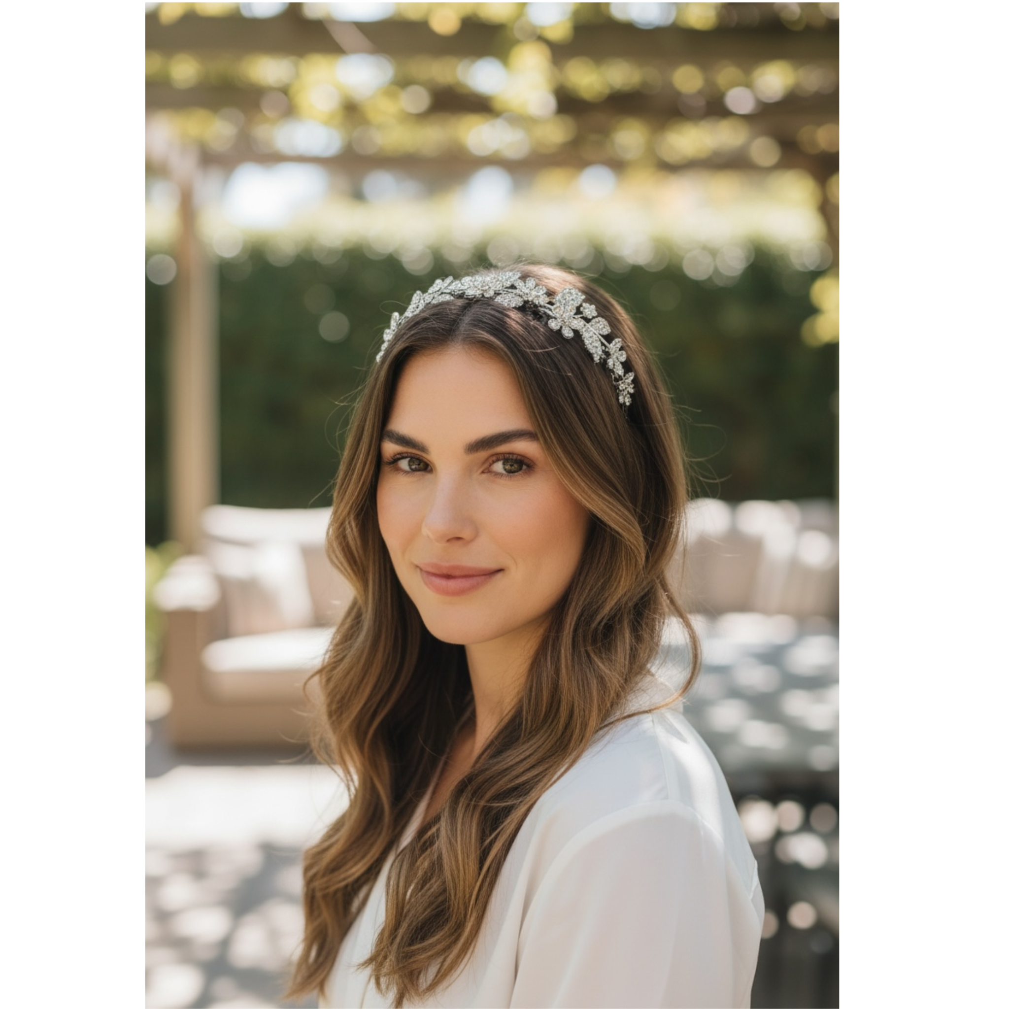 Woman wearing a decorative headband with a blurred outdoor background