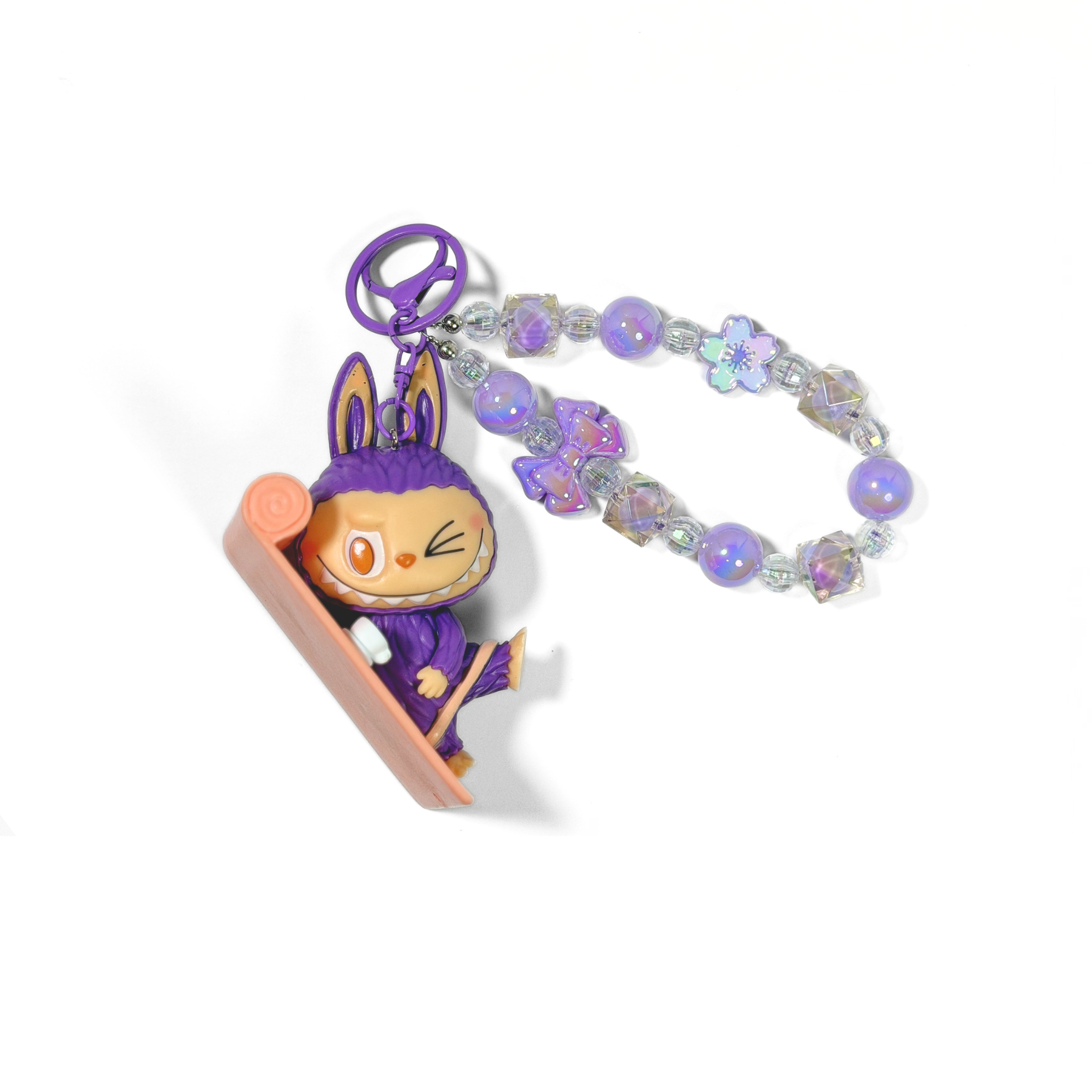 Labubu Lazy Yoga Keychain and beaded chain on a white background