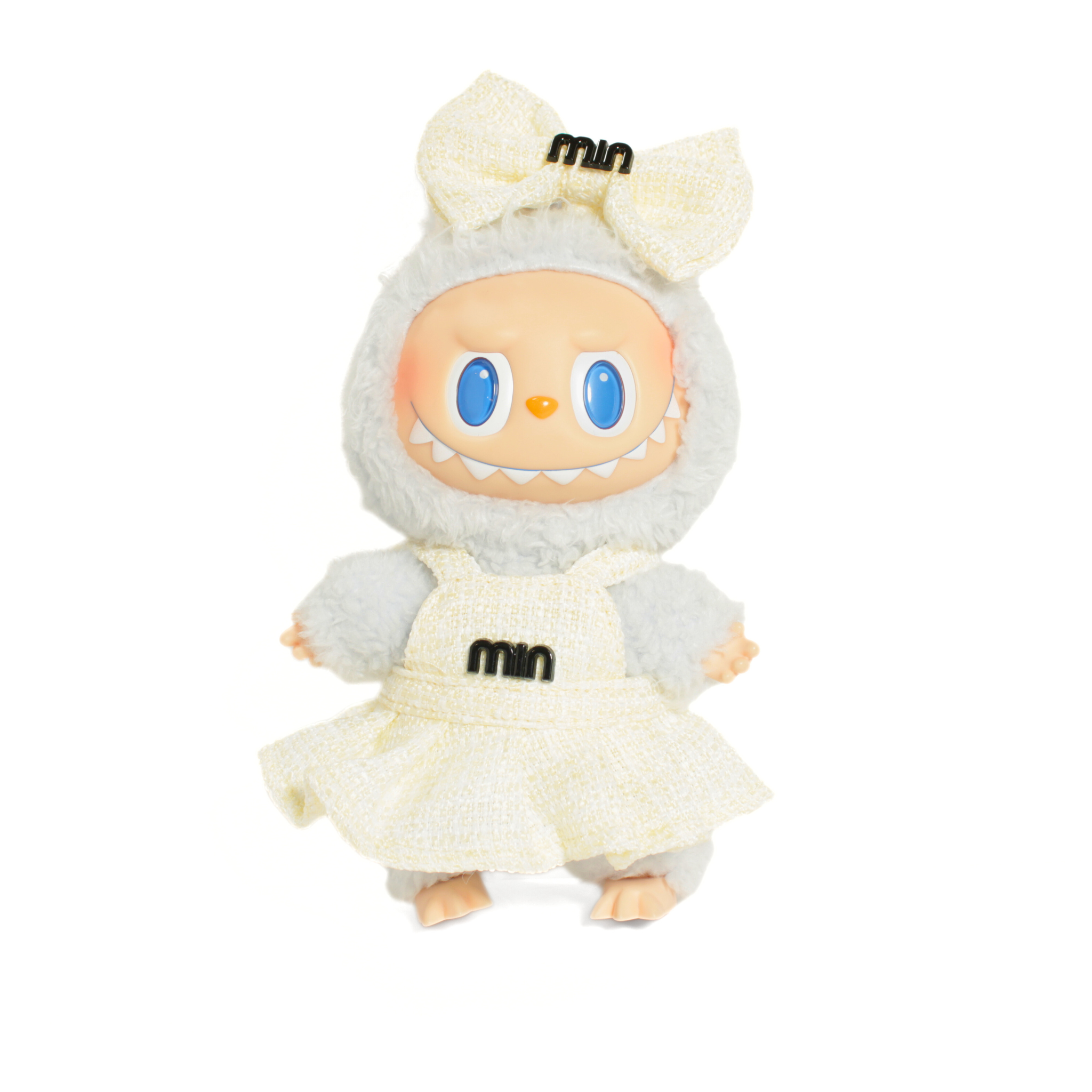 Plush toy with a white outfit and bow on a white background