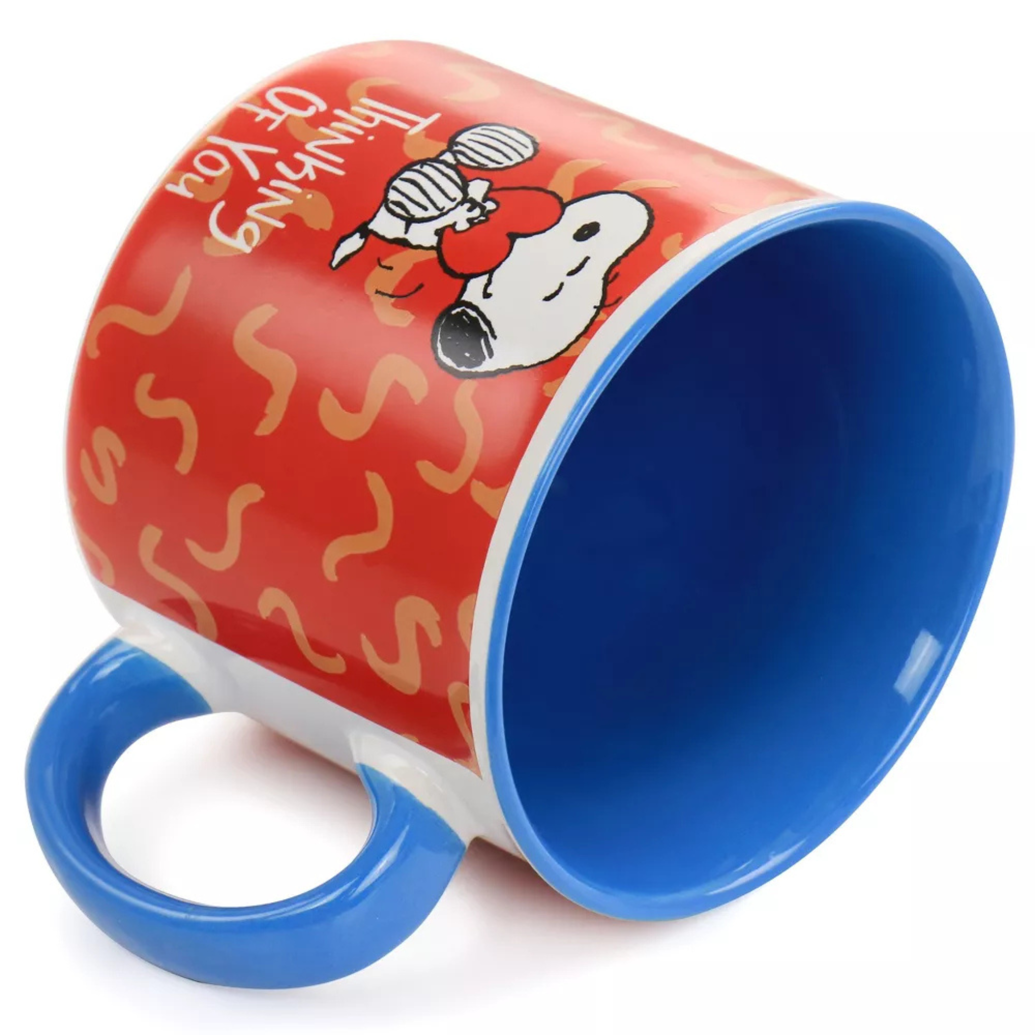 Colorful mug with Snoopy cartoon design on a white background