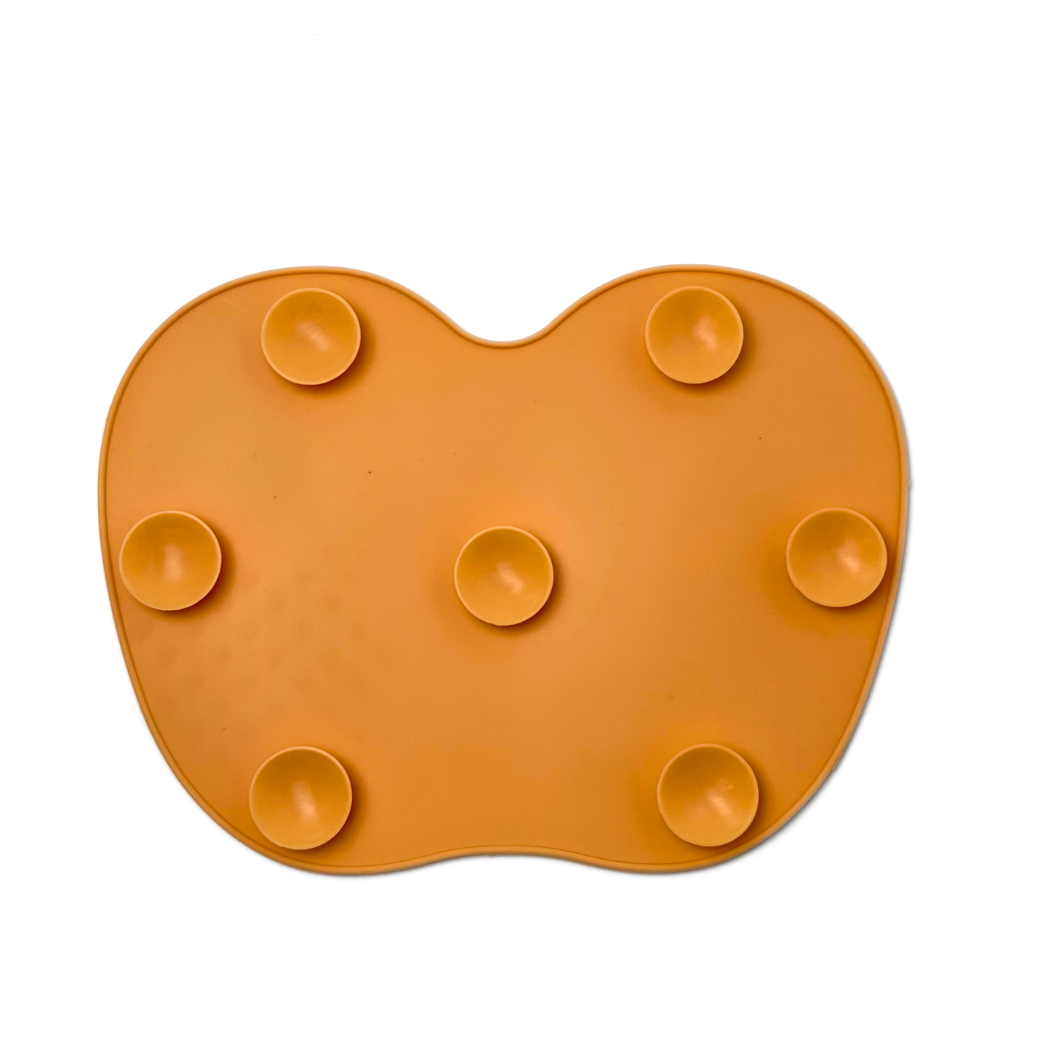 S.he Makeup Brand Cleaning Brush Mat in color orange on a white background