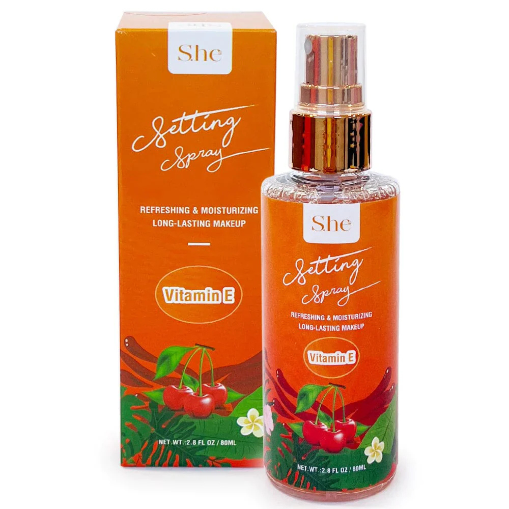 S.he setting spray with vitamin E in orange packaging and cherry design on a white background