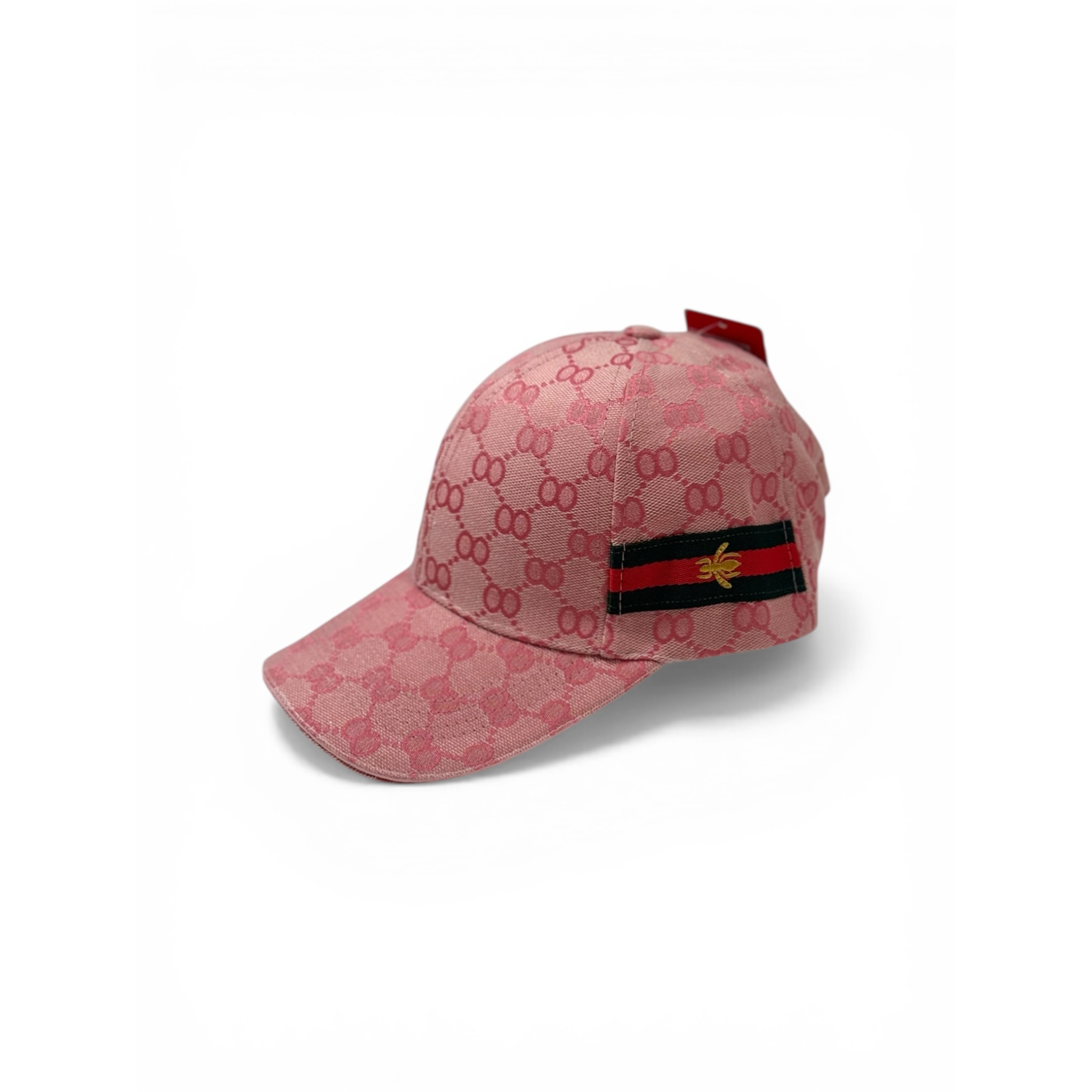 Pink cap with two green and red stripe design on the side of the cap.  on a white background