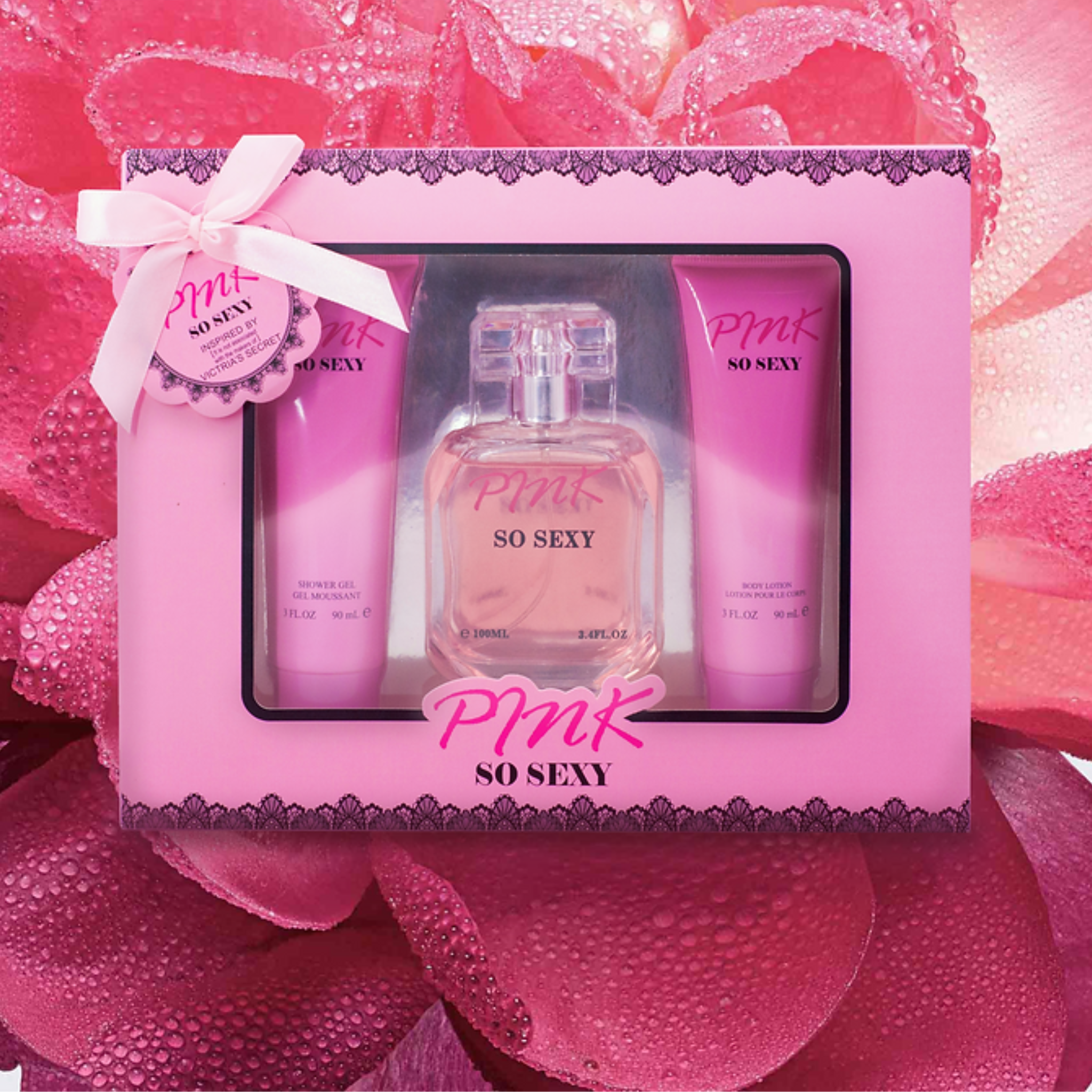 Pink 'So Sexy' perfume set with bottles and packaging on a pink floral background. This fragrance is from EBC Collection. 